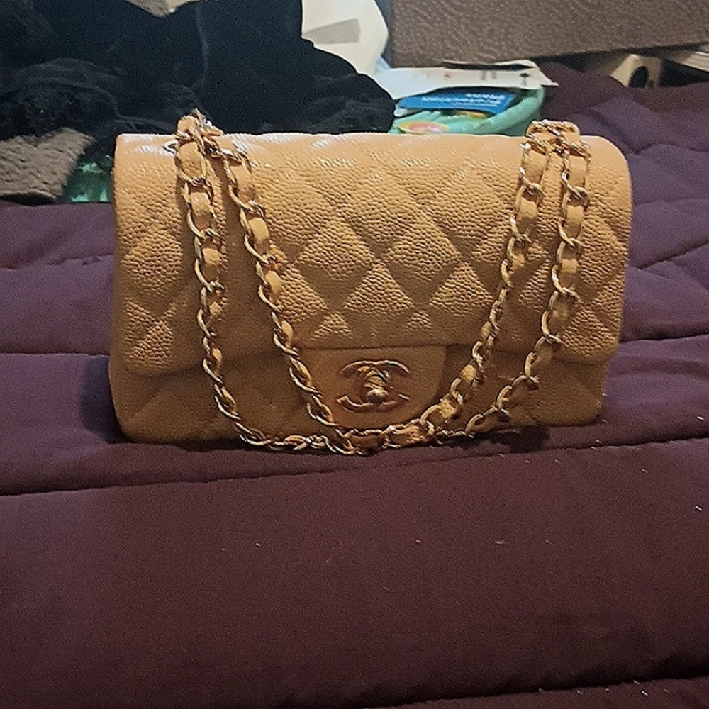 Chanel lambskin double fold handbag, in beige with gold hardware, and dusterbag.